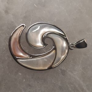 Elegant Silver and Pearl Swirl Pendant